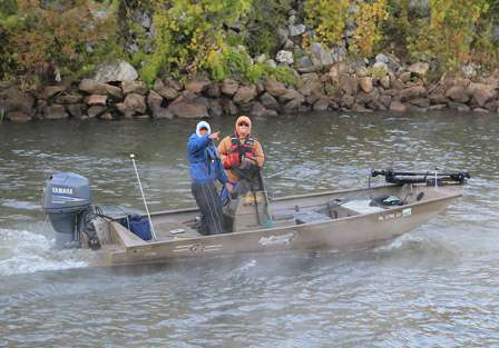 Keith Poche points up river -- his choice in boats for this tournament will allow him to get into the 