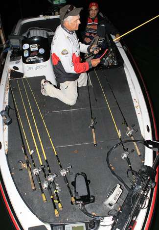 Jeff Jordan lays out his rods in preparations to do battle with the bass of Lake Texoma.