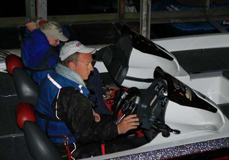 Chris Ford looks over the options on his GPS unit as he waits for the start of the launch proceedings.