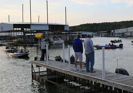 Tournament Director Chris Bowes calls out the final boat numbers as the Day Two launch nears the end.