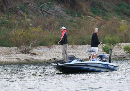 Pro Aaron Johnson and co-angler Travis Gray work a protected bank just off the main lake.