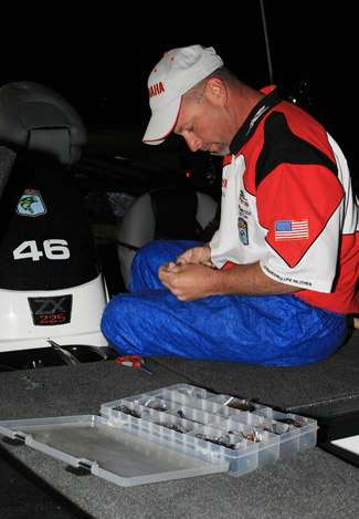 Abe Kalechman replaces a lure on one of the rods he will use on Day One of the BFNC.