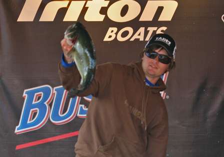 Danny Jones holds up this 5.98-pound largemouth that helped him finish Day Two in 24th place.