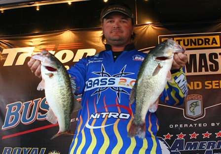 Dustin Evans holds up part of the 61.09 pounds he weighed in this week, finishing fifth on the boater side.