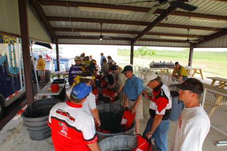 Anglers await their turn during the weigh-in