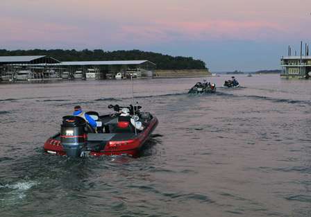 The first boats make their way out onto Lake Texoma, which is almost 40,000 square miles in size.