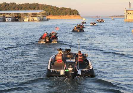 The final boats make their way out onto Lake Texoma on Thursday.