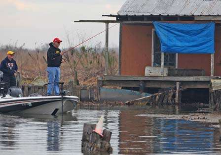 George Crain, a Federation Nation angler from Alabama, fishes around a fish cam in the Louisiana Marsh Wednesday.