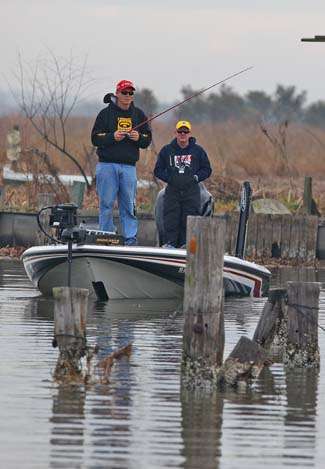 The Louisiana Marsh provides a lot of cover options for bass to be found, like these pilings George Crain is fishing.