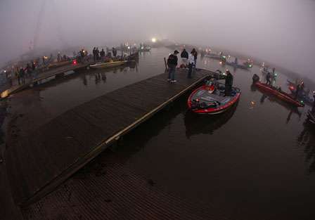 Anglers wait in the fog, which would end up delaying the start by an hour and 10 minutes.