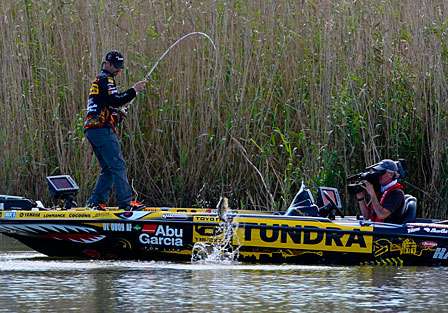 Mike Iaconelli lifts a nice bass into the boat.