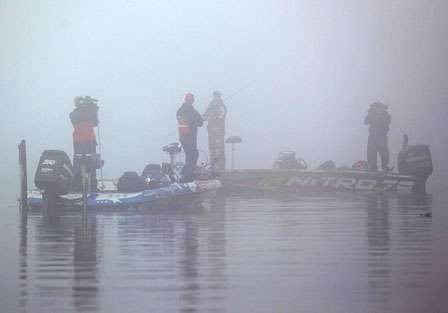Scott Rook and Kevin VanDam speak briefly before the fog lifted Saturday morning.