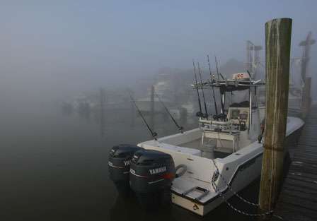 Most boats at Venice marina were idle as recreational anglers waited for the fog to lift.