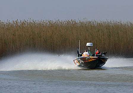 Kevin Wirth follows in Skeet Reese's wake as several boats make their way to the Venice area.