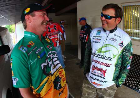 Dennis Tietje and Greg Hackney shared a laugh and a few fishing stories before the anglers meeting. 
