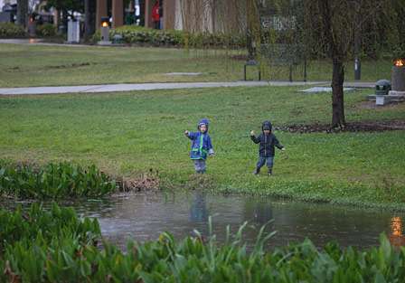 Youngsters always enjoy the rain.