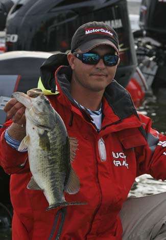 Casey Ashley holds up his largest fish of Day One. He finished the day in 28th with 12-6.
