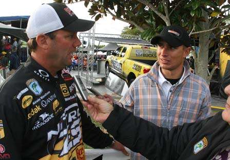 Kevin VanDam is interviewed by reporters after finishing the day in 4th place with 17-9.