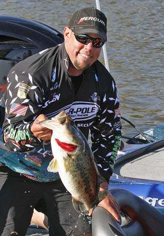 Chris Lane holds up his best fish of the day prior to the weigh-in.