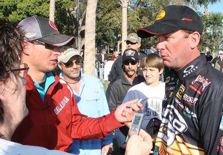 After moving into second place, Kevin VanDam is interviewed by the media.