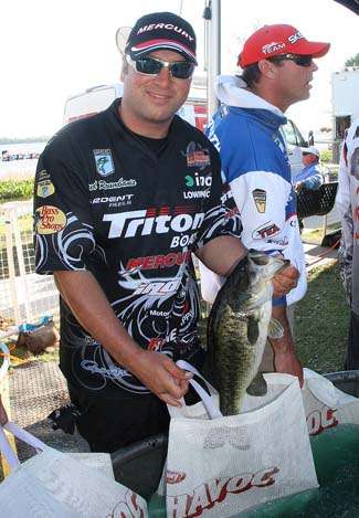 Fred Roumbanis holds up one of his best fish on Friday.