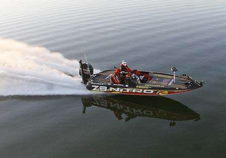 Kevin VanDam boats across Lake Harris to his first spot Sunday.