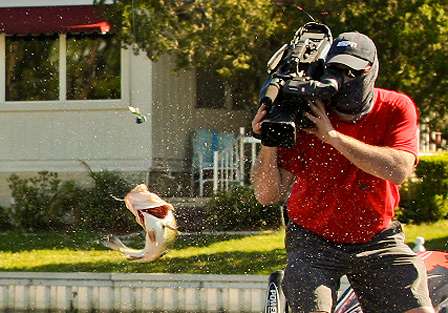 Cameraman Rick Mason moves in to get a tight shot of Goldbeck's fish. 