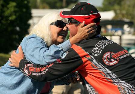 Goldbeck got a quick congratulatory hug from Barbara Hemengway-Marks, who has watched him fish every day from her boat dock. 