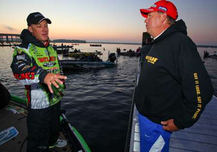 First and second place anglers, Alton Jones and Brent Chapman, visit before the morning launch. 