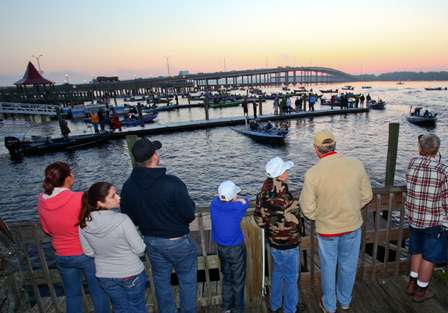 Spectators gather to watch the morning launch. 