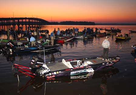 John Crews power poles down and waits with the other anglers for the take-off.