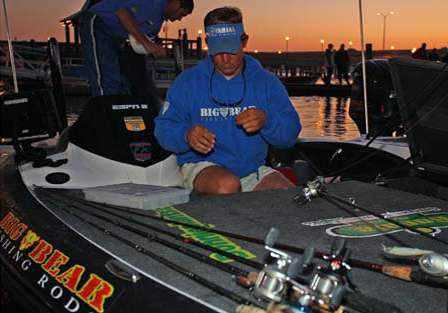 Keith Poche ties on lures before getting started.