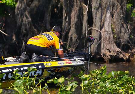 Scroggins gets low to avoid spooking a bass off its bed. 