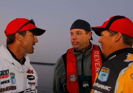 Edwin Evers and Terry Sroggins visit with Chigger Brumbelow before the morning launch. 