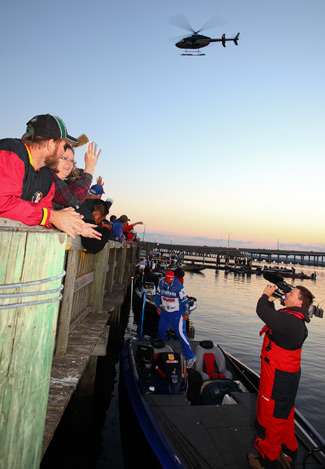 Anglers prepare for launch time after the national anthem is played. 