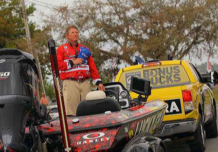 Kelly Jordon stands at attention during the national anthem before the Day Four weigh-in of the Power-Pole Citrus Slam.