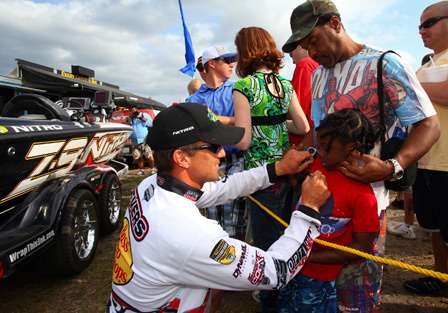 Tournament champion Edwin Evers signed autographs before being pulled to the stage. 