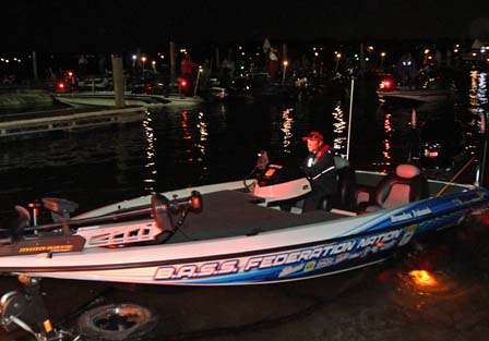 The Bass Federation Nation-wrapped boat of Brandon Palaniuk puts in.