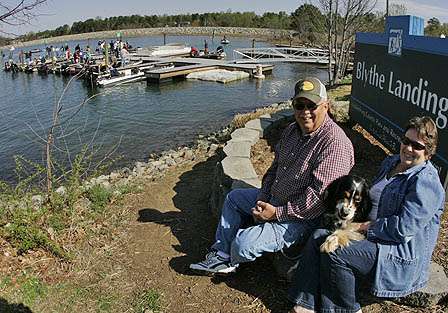Gene and Lora Rector enjoy the weigh-in at Blythe Landing with English setter Smokey, who made an appearance in Pointing Dog Journal after pointing at 8 weeks old.