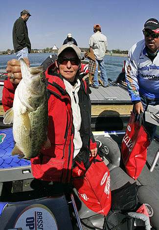 Co-angler Kathy Freehling shows off her best after a day riding with Florida pro Cecil Douberly.