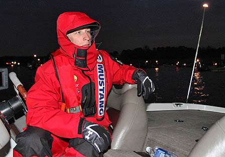 Shryock takes position at the dock as he awaits the 7 a.m. launch.