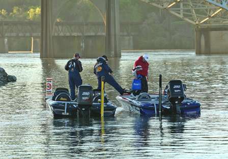 An angler gets dropped off at his boat on Day One of the Alabama Charge on Pickwick Lake.
