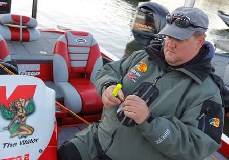 Kenyon Hill adjusts a lure as he waits for the Day One launch to begin.