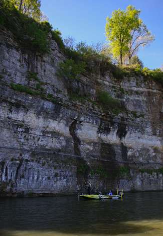 Skeet Reese fishes one of the many towering bluffs along Pickwick Lake. 