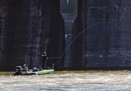 Bernie Schultz makes a long cast along the dam wall. 