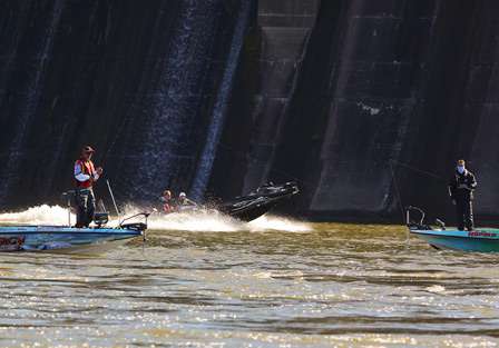Greg Vinson comes off plane and joins the fray below Wilson Dam. 