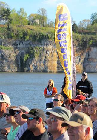 Fans watch the weigh-in with the bluffs across Pickwick as a backdrop.