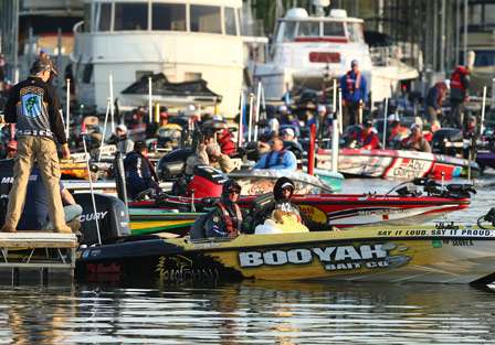 Butcher leads the rest of the field away from the dock as Day Two of competition gets underway.