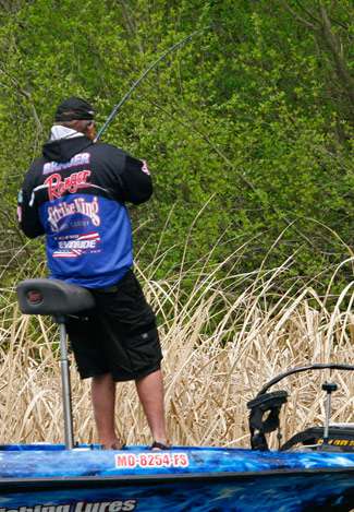 Denny Brauer was getting quite the workout as he jerks on a fish deep in the cover.