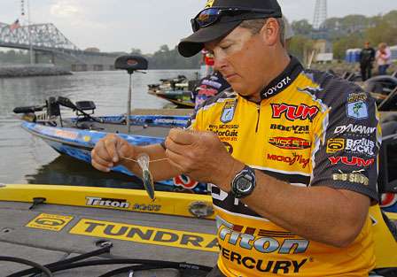 Terry Scroggins rigs up a crankbait for Day Four of competition.